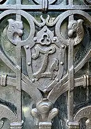Gothic Revival cartouche with initial on a door of the Vasile Zottu House (Strada C.A. Rosetti no. 7), Bucharest, unknown architect, 1909