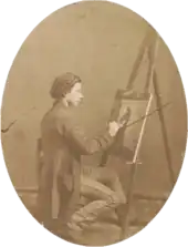 Henry Mosler working on a painting, 1860