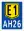 AH26 (E1) sign.svg