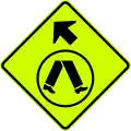 (W6-V2-1) Pedestrian Crossing Ahead on Side Road (veer left) (used in Victoria and Queensland)