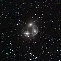 Vela ring galaxy, and a bright star known as HD 88170.