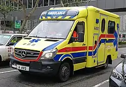 Hong Kong Fire Service ambulance, in its updated yellow livery