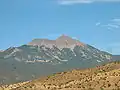 Little Tuk (left) and Mt. Tukuhnikivatz (right) of the La Sal Range in summer, seen from the south.