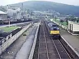 A class 24 arrives at Rothes with a train for Aberdeen in May 1968