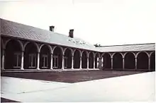 The Cloisters and Union Building at the University of Adelaide (1927) as it appeared in 1930.