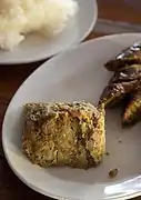 Aep ong-o, a northern Thai dish of chopped pig's brain mixed with egg and a Thai curry paste. It is wrapped in banana leaves and grilled.