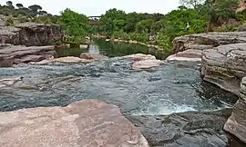 The River Aille and waterfall, next to the former sawmill, in Vidauban