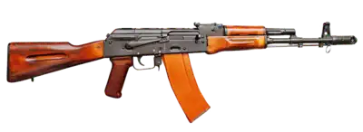 Early AK-74 assault rifle with rust-colored plastic magazine and laminated wood furniture