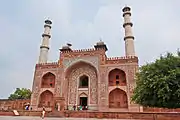 Akbar's Tomb at Agra, India, uses red sandstone and white marble, like many of the Mughal monuments. The Taj Mahal is a notable exception, as it uses only marble.