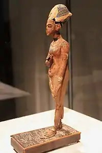 Wooden standing statue of Akhenaten. Currently in the Egyptian Museum of Berlin.