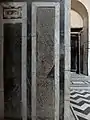 Black marble panels with finely-carved calligraphic compositions, a feature not found in earlier Mamluk architecture