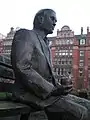 Alan Turing Memorial close-up, showing the apple he holds.