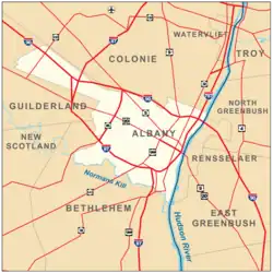 Map shows Albany on the west bank of the Hudson, surrounded by the towns of Colonie, Guilderland, and Bethlehem. Roads are also shown. Interstates 90, 87, and 787 pass through the city boundaries.