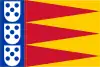 Blue vertical banner on the left with 3 vertically stacked white shields with 5 blue points each. Alternating red and yellow triangles on the rest of the flag.