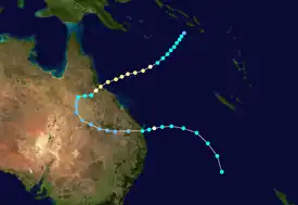 Map of eastern Australia and the western South Pacific Ocean with a color-coded track that shows the path of the cyclone