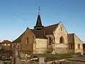 The church surrounded by the cemetery.