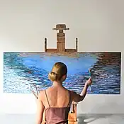 Photo of a female painter.