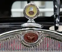 An American Austin hood ornament