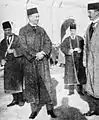 Americans wearing jobbeh va kolah (traditional Persian clothes) at the opening of The Majles, January 29, 1924. Mr. McCaskey, Dr. Arthur Millspaugh, and Colonel MacCormack are seen in the photo.