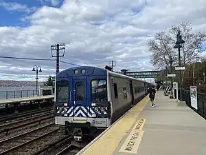 An 8 car M7A prepares for departure at Ardsley-on-Hudson station, heading towards Croton–Harmon station just 6 stations away. Car 4146 is seen trailing, with 4309 and 4308 leading the train