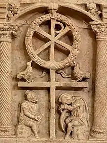 The Chi-Rho with a wreath symbolizing the victory of the Resurrection, above Roman soldiers, c. 350.