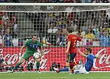 Iniesta takes a shot