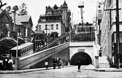 Low end view of the original Angels Flight with the 3rd Street Tunnel and an observation tower, c. 1905.