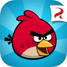 A square-shaped game image of Red on a blue outwards-striped background. The Rovio Entertainment logo is inside a white banner located in the top right corner.