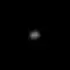 A blurry ellipsoidal object in the center of the image