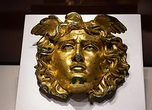 Aplique with the shape of Gorgona Medusa