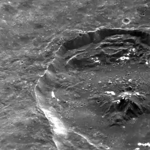 MESSENGER image at high sun angle, showing the northern crater and possible hollows