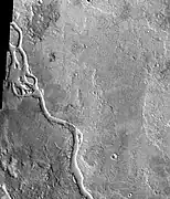 Apsus Vallis, as seen by THEMIS.  Apsus is near the Elysium volcanic system; it may have been partially formed by the action of lava.