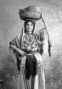 A Traditional Women's Dress in Ramallah, c. 1920.