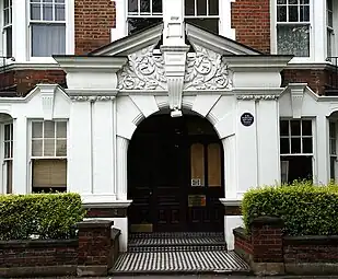 Arlington Park Mansions on Sutton Lane North, facing Turnham Green, with E. M. Forster blue plaque