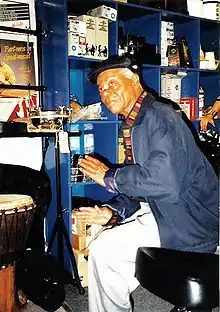 Armando Peraza playing a bongo in London, 1999