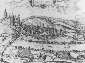 View of a castle, a small town at the bottom of a mountain, and a monastery. A sign in the upper part of the illustration says "Arnsberg". In the foreground, two men, presumably the lord of the castle and a visitor, watch a horse and rider depart; in the middle ground, a "new" bridge spans a river, labeled Rurh, (the old one is in ruins slightly to the left). Castle is on the left, town in the middle, and a monastery (designated by crosses) is on the far right.