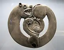 Curled-up feline animal from Arzhan-1, circa 800 BC.