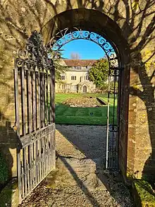 View across the Private Garden Lily Pond to the East Facade -- Inigo Thomas' Third Axis