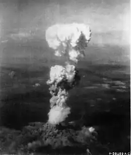 Black and white photo of a mushroom-shaped cloud