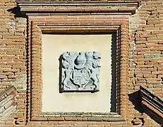 Arms in facade of castle