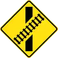 (W7-9) Railway Level Crossing on Road ahead (skewed) (left)