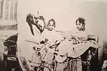 Photograph showing Qadr with is father Wajid Ali Shah and his mother Begum Hazrat Mahal