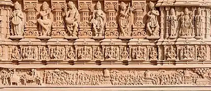 Exterior wall carvings depicting the Rath Yatra festival of Jagannath in Odisha