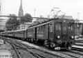 An old Bodensee-Toggenburg (Switzerland) motor coach pulling four coaches: not an EMU and not a railcar