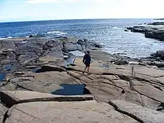 From the top of the lighthouse Pointe des Monts bedrock, gulf side