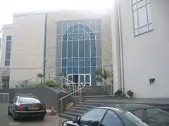 Entrance to the main mosque with a view of the glass entrance.