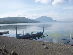 Fishing boats on the shore of Taal Lake