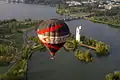 Hot air balloon over Lake Burley Griffin, showing the National Carillon