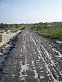 Baltimore Boulevard, designed as the main street of a planned sea resort; road and early construction were washed away in a 1962 storm, and the area soon after became protected by the federal government.