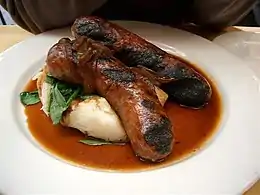 "Bangers and mash": sausages, from Roman times and mashed potato (1588–1593)